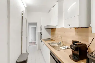 Cuisine ou kitchenette dans l'établissement Élégance & confort à deux pas de la Madeleine