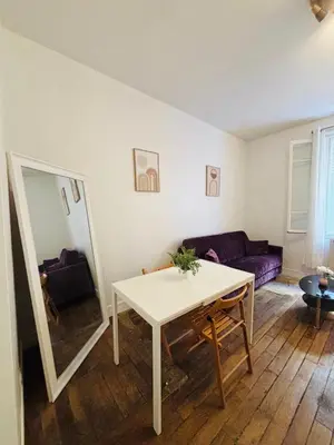 Coin salon dans l'établissement Appartement Boucicaut Tour Eiffel