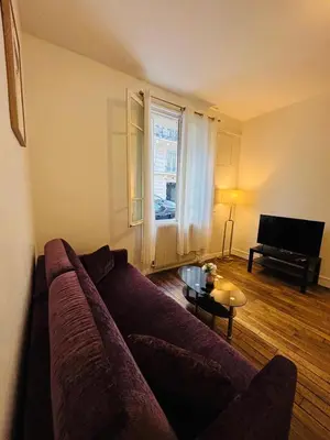 Coin salon dans l'établissement Appartement Boucicaut Tour Eiffel
