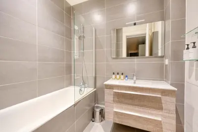 Salle de bains dans l'établissement AV Experiences - Appartement Bugeaud Luxury