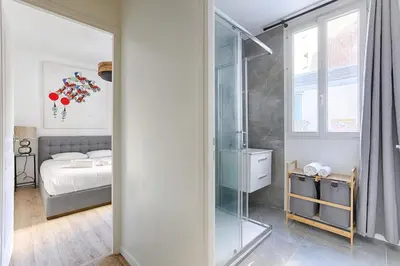 Un ou plusieurs lits dans un hébergement de l'établissement Traversière III Boulogne-Billancourt Apartment4P