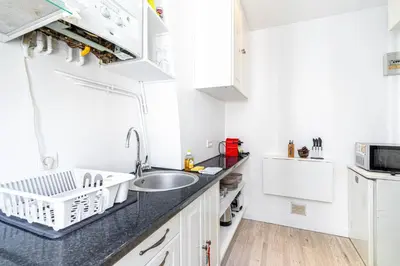 Cuisine ou kitchenette dans l'établissement GuestReady - Gambetta Hideaway