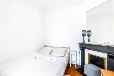 Un ou plusieurs lits dans un hébergement de l'établissement GuestReady - Gambetta Hideaway