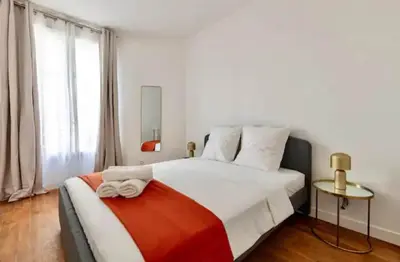 Un ou plusieurs lits dans un hébergement de l'établissement Appartement 2 pieces Boulogne-Billancourt