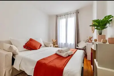 Un ou plusieurs lits dans un hébergement de l'établissement Appartement 2 pieces Boulogne-Billancourt