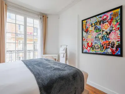 Un ou plusieurs lits dans un hébergement de l'établissement Charming apartment - 2BR 4P- Javel