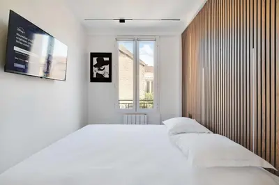 Un ou plusieurs lits dans un hébergement de l'établissement Charming Appt - 1BDR 4P - Saint Ouen