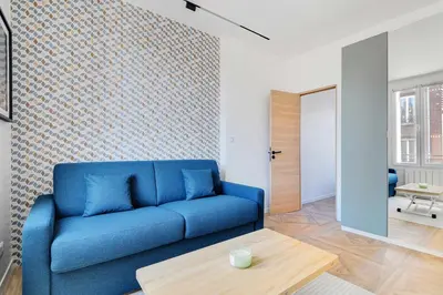 Coin salon dans l'établissement Charming Appt - 1BDR 4P - Saint Ouen