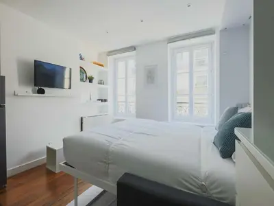Un ou plusieurs lits dans un hébergement de l'établissement Modern apartment -1BR-3P-Ternes
