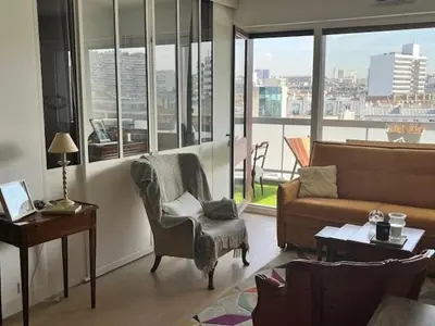 Coin salon dans l'établissement 4-bed apartment PARIS 12