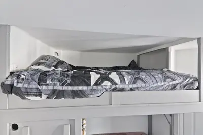 Un ou plusieurs lits dans un hébergement de l'établissement Très Petit Studio Calme Proche Buttes-Chaumont