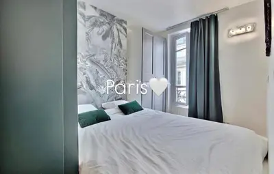 Un ou plusieurs lits dans un hébergement de l'établissement PARIS with Love !