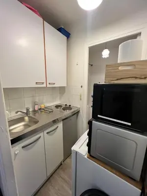 Cuisine ou kitchenette dans l'établissement Paris center cosy 2pax private flat