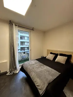 Un ou plusieurs lits dans un hébergement de l'établissement Une pièce Issy-les-Moulineaux