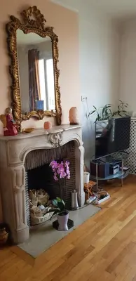 Télévision ou salle de divertissement dans l'établissement Vue tour Eiffel