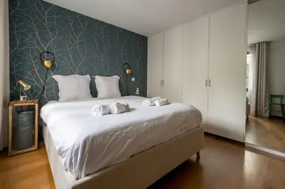 Un ou plusieurs lits dans un hébergement de l'établissement Maison Loft Verzy - Nomad by Welkeys