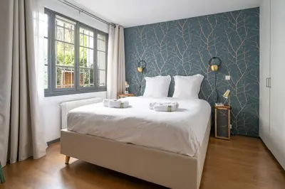 Un ou plusieurs lits dans un hébergement de l'établissement Maison Loft Verzy - Nomad by Welkeys