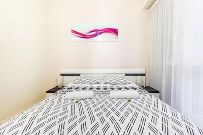Un ou plusieurs lits dans un hébergement de l'établissement GuestReady - Bright charm with a terrace