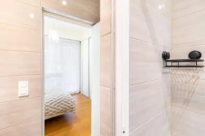 Un ou plusieurs lits dans un hébergement de l'établissement GuestReady - Bright charm with a terrace