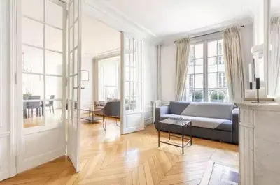 Coin salon dans l'établissement Luxe Appartement Des Champs-Élysée