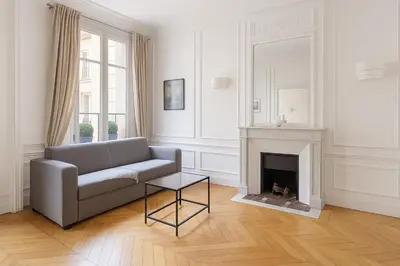 Coin salon dans l'établissement Luxe Appartement Des Champs-Élysée
