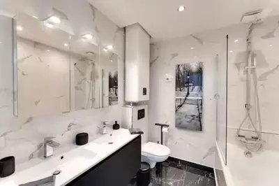 Salle de bains dans l'établissement Luxe Appartement Des Champs-Élysée