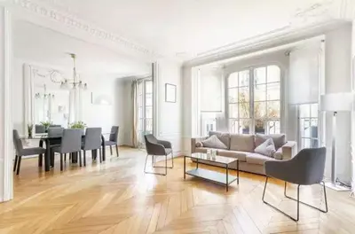 Coin salon dans l'établissement Luxe Appartement Des Champs-Élysée