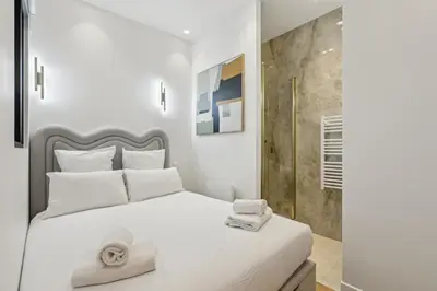 Un ou plusieurs lits dans un hébergement de l'établissement Appartement Guersant Pereire