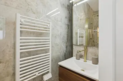 Salle de bains dans l'établissement Appartement Guersant Pereire