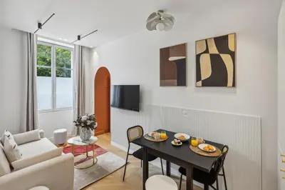 Télévision ou salle de divertissement dans l'établissement Appartement Guersant Pereire