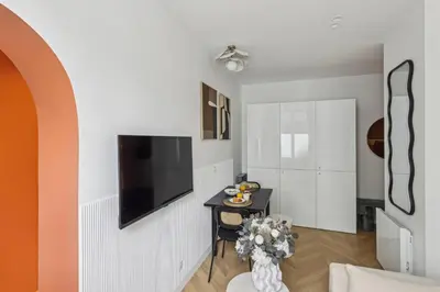 Télévision ou salle de divertissement dans l'établissement Appartement Guersant Pereire