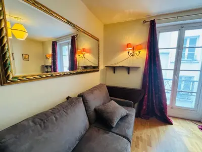 Coin salon dans l'établissement Studio 150m to Notre Dame