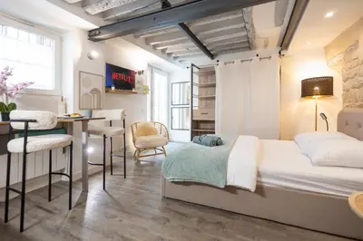 Coin salon dans l'établissement Studio Cosy Paris Centre République Marais