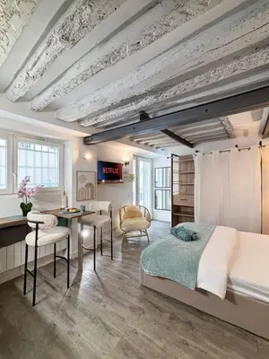 Coin salon dans l'établissement Studio Cosy Paris Centre République Marais