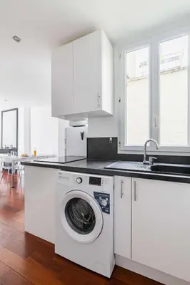 Cuisine ou kitchenette dans l'établissement Appartement coeur paris 16 victor hugo - 4P