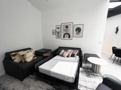 Un ou plusieurs lits dans un hébergement de l'établissement 08 - Design Flat Republique