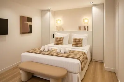 Un ou plusieurs lits dans un hébergement de l'établissement Chic Studio Charonne, Haut-Marais