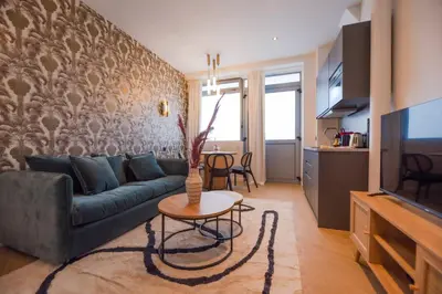 Télévision ou salle de divertissement dans l'établissement 2Cozy1BR#Exhibition Centre