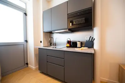 Cuisine ou kitchenette dans l'établissement 2Cozy1BR#Exhibition Centre