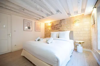Un ou plusieurs lits dans un hébergement de l'établissement 1BR#Turenne#Place des Vosges
