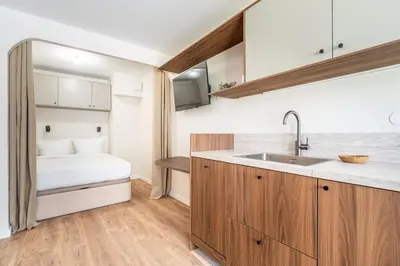 Cuisine ou kitchenette dans l'établissement Studio Cozy Design - Batignolles