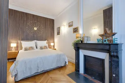 Un ou plusieurs lits dans un hébergement de l'établissement Luxury 2-Bedroom for 6 - Avenue Montaigne
