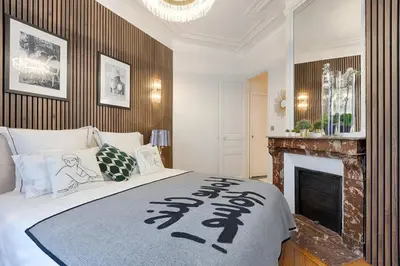 Un ou plusieurs lits dans un hébergement de l'établissement Luxury 2-Bedroom for 6 - Avenue Montaigne