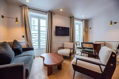 Coin salon dans l'établissement Relax in Paris XII