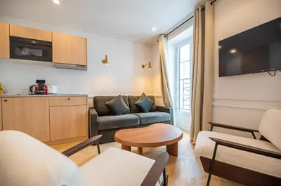 Télévision ou salle de divertissement dans l'établissement Relax in Paris XII