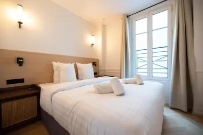 Un ou plusieurs lits dans un hébergement de l'établissement Lovely Flat in Austerlitz - Bastille