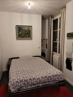 Un ou plusieurs lits dans un hébergement de l'établissement Studio calme proche Montmartre et Batignolles - Metro 13 et 14