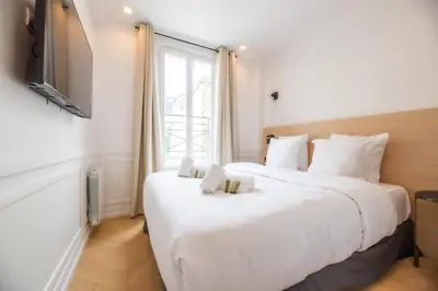 Un ou plusieurs lits dans un hébergement de l'établissement 1 Bedroom Flat - Crémieux, Bastille