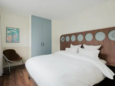 Un ou plusieurs lits dans un hébergement de l'établissement Edgar Suites Levallois - Anatole France