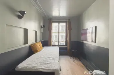 Un ou plusieurs lits dans un hébergement de l'établissement Flexliving - Studio - Manuel